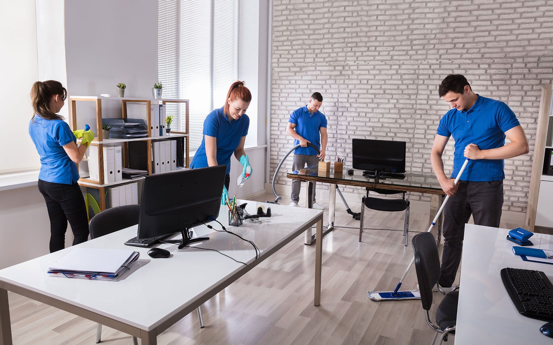 Professional commercial cleaning team at work